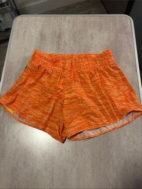 Orange Striped rabbit lined running shorts - women’s Large